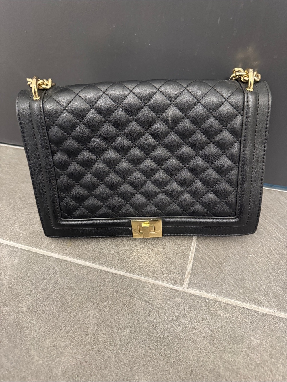 Black Quilted Leather Shoulder Bag with Gold Hardware